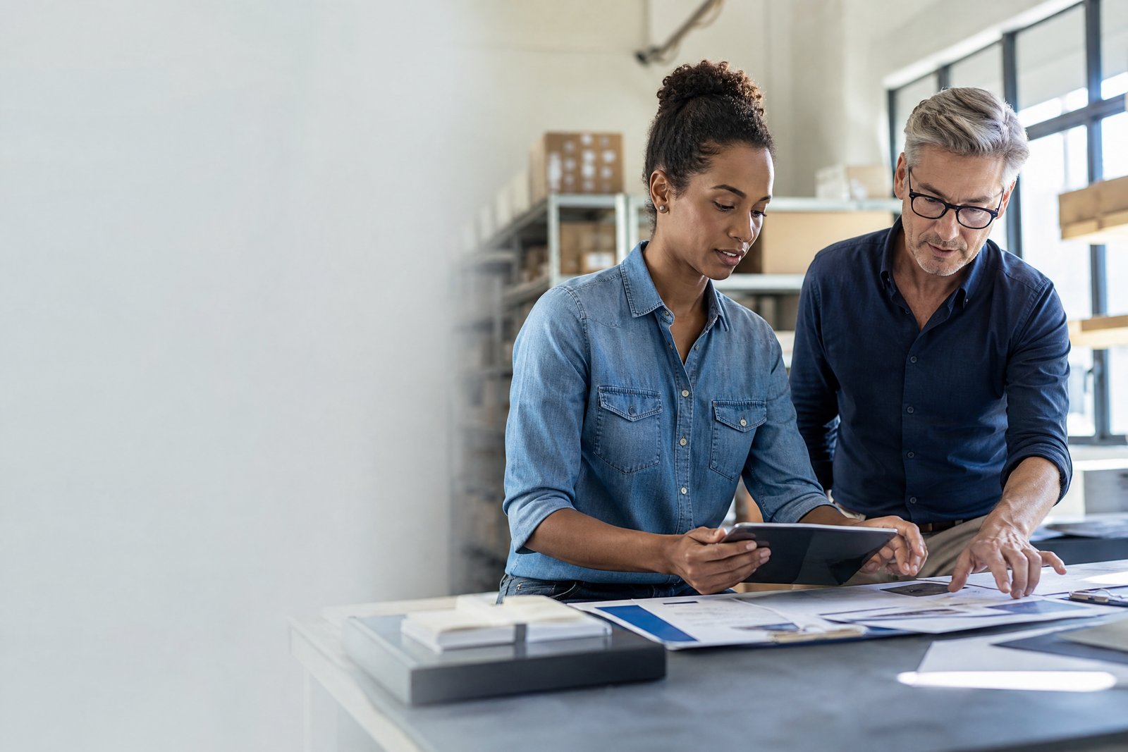 Business owners reviewing plans for a business term loan